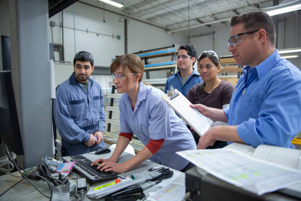 Photo of teachers and kids doing STEM projects